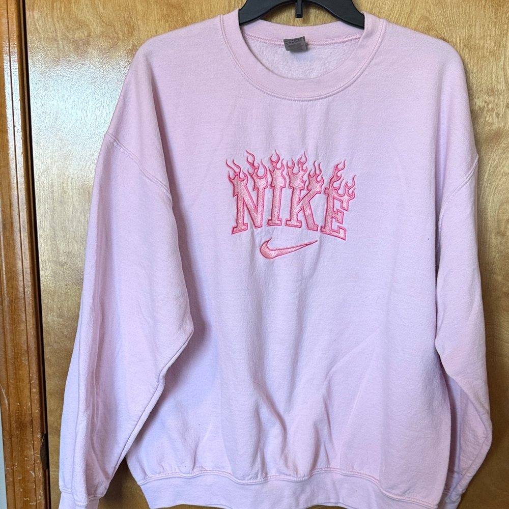 Custom embroidered athletic logo- Light Pink Flame Sweatshirt.  Gildan brand.